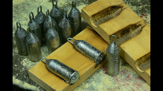 Making lead fishing weights in wooden moulds